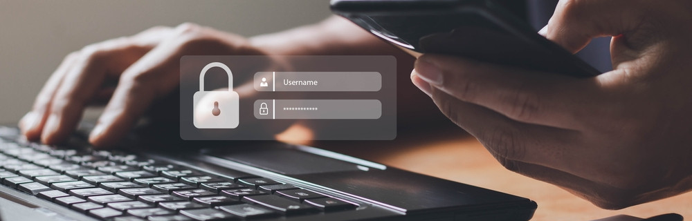 Hands typing with a lock